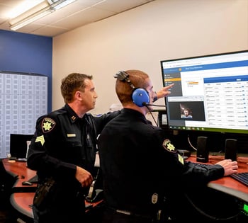 A smart security locker system is being used by two law enforcement police officers