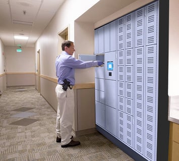 Evidence, weapons, and equipment are stored in a smart locker by a law enforcement officer