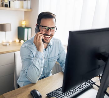 A man working from home on a hybrid working scheme