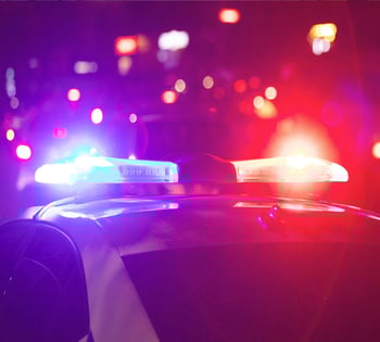 Red and blue lights on a police patrol car