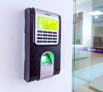 An access control panel with biometrics installed in facilities to track who has accessed the facility and when