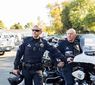 Two Police Officers Using a Motorcycle