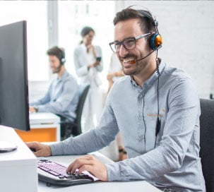 Customer support agent from Real Time Networks assisting a client.