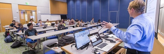 A teacher doing a lecture in a classroom