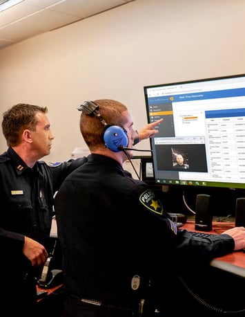 A law enforcement officer inspects the security data of an organization 