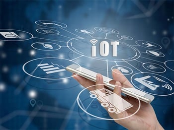 Cloud-connected IoT and edge devices visualized on a smart interface, representing hybrid cloud physical security architecture combining on-premises systems, edge processing, and cloud-based security management.