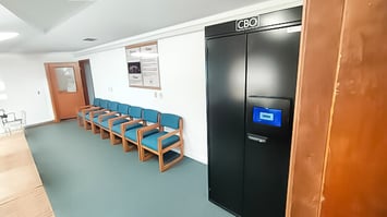 Secure armory management system in a correctional facility lobby enabling controlled access and automated reporting for police departments