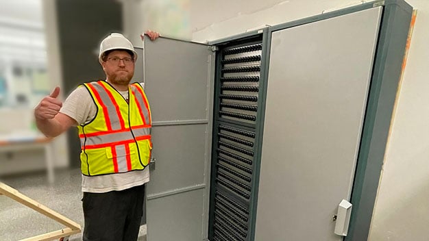 At BC Hydro, a Real Time Networks Engineer checks the quality of a recently installed KeyTracer Key Management system.
