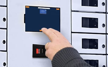 User follows a Smart Terminal prompt to weigh an item before returning it to an intelligent locker compartment.