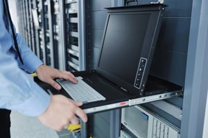 Business man engineer using asset locker in server room