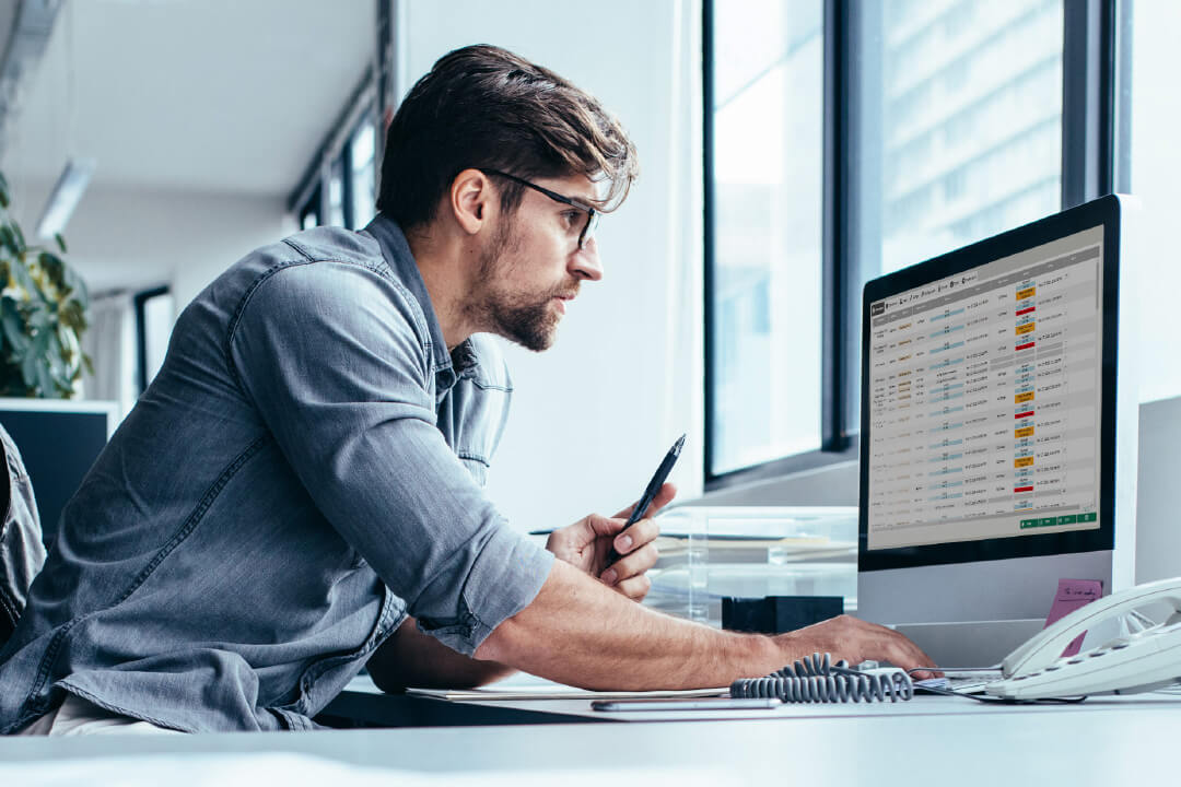 Man operating a smart fleet management system