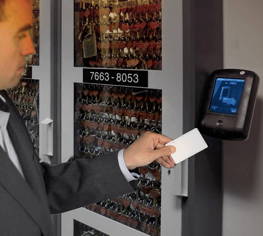 Employee accessing an key management system using an access card