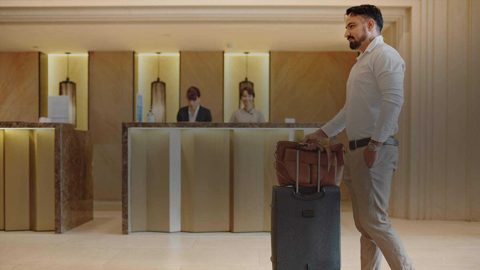 A guest arrives at a hotel equipped with a smart security system