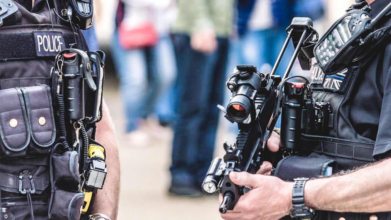 Armed police officers protecting the public