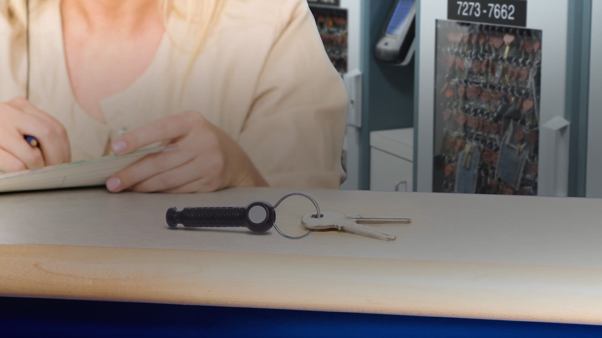 Woman Using an Electronic Key Management System