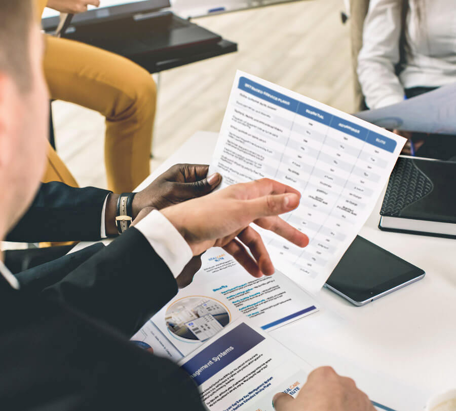 Real Time Networks Experts helping an employee choose the right RealCare Extended Service Plan